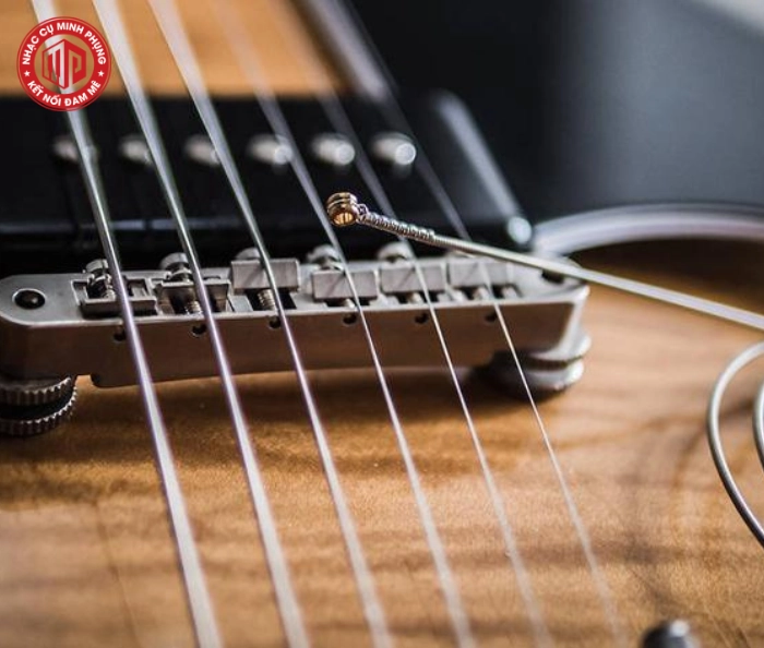 vat-lieu-lam-day-dan-guitar