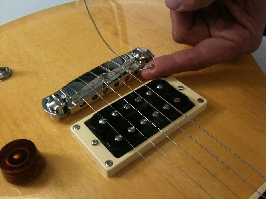 chọn dây đàn guitar không đau tay