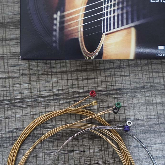 chọn dây đàn guitar không đau tay