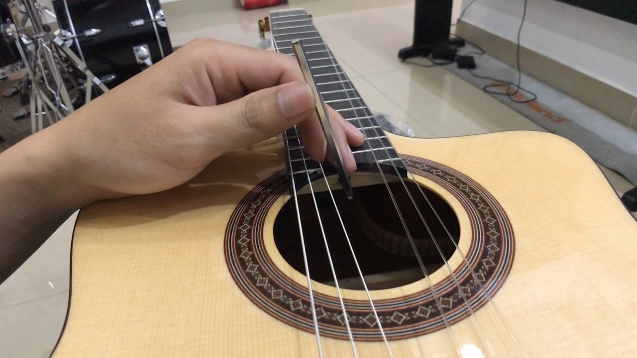 chọn dây đàn guitar không đau tay