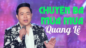 Chuyện Ba Mùa Mưa​​ - Quang Lê | Lời bài hát, hợp âm, MV